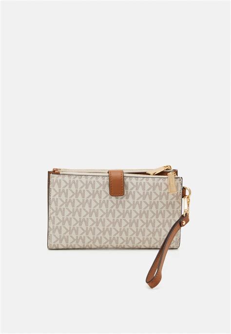 michael kors jet set wristlet grey|Michael Kors jet set crossover.